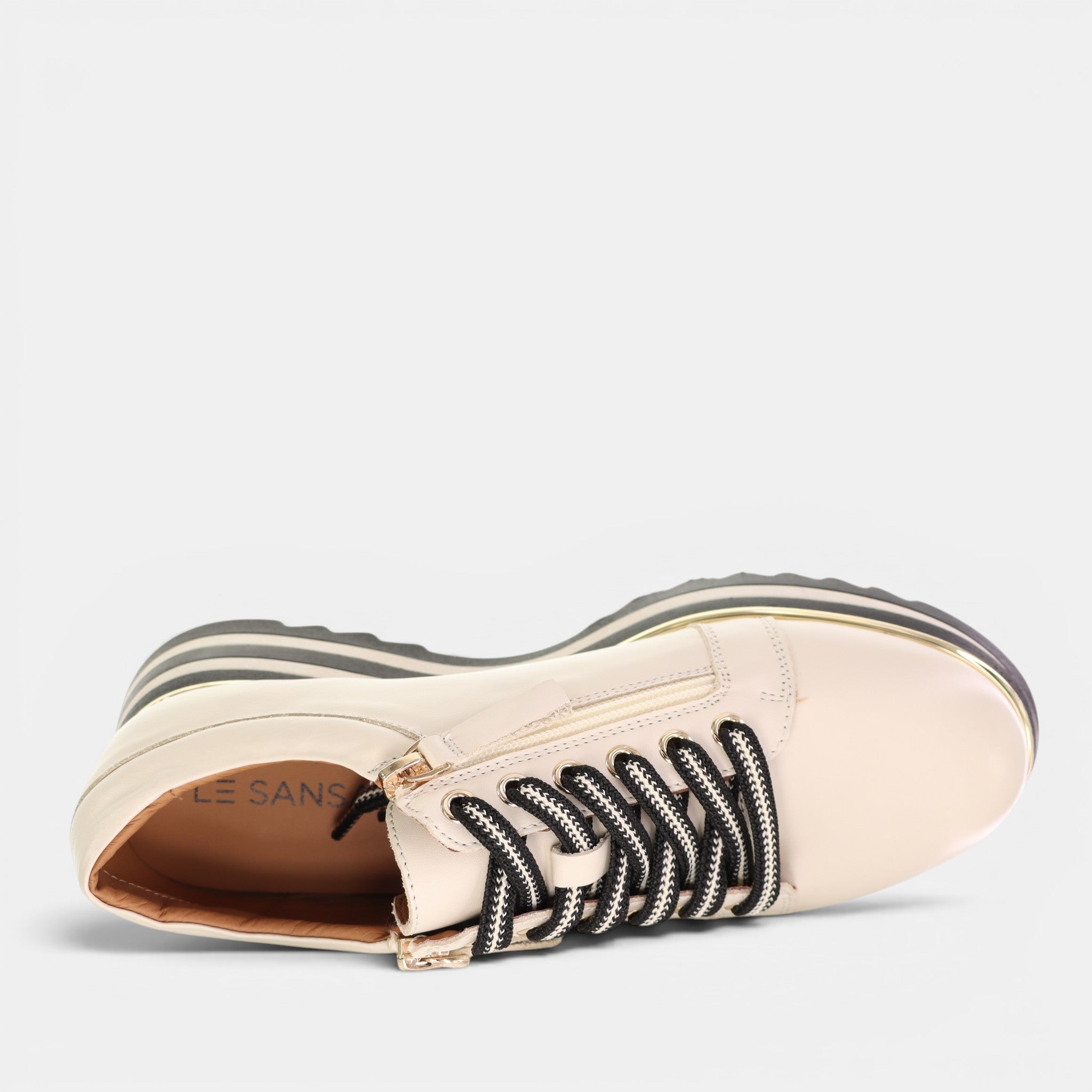 Le Sansa Sippa cream sneakers with white laces and chunky sole, stylish casual footwear for everyday wear.