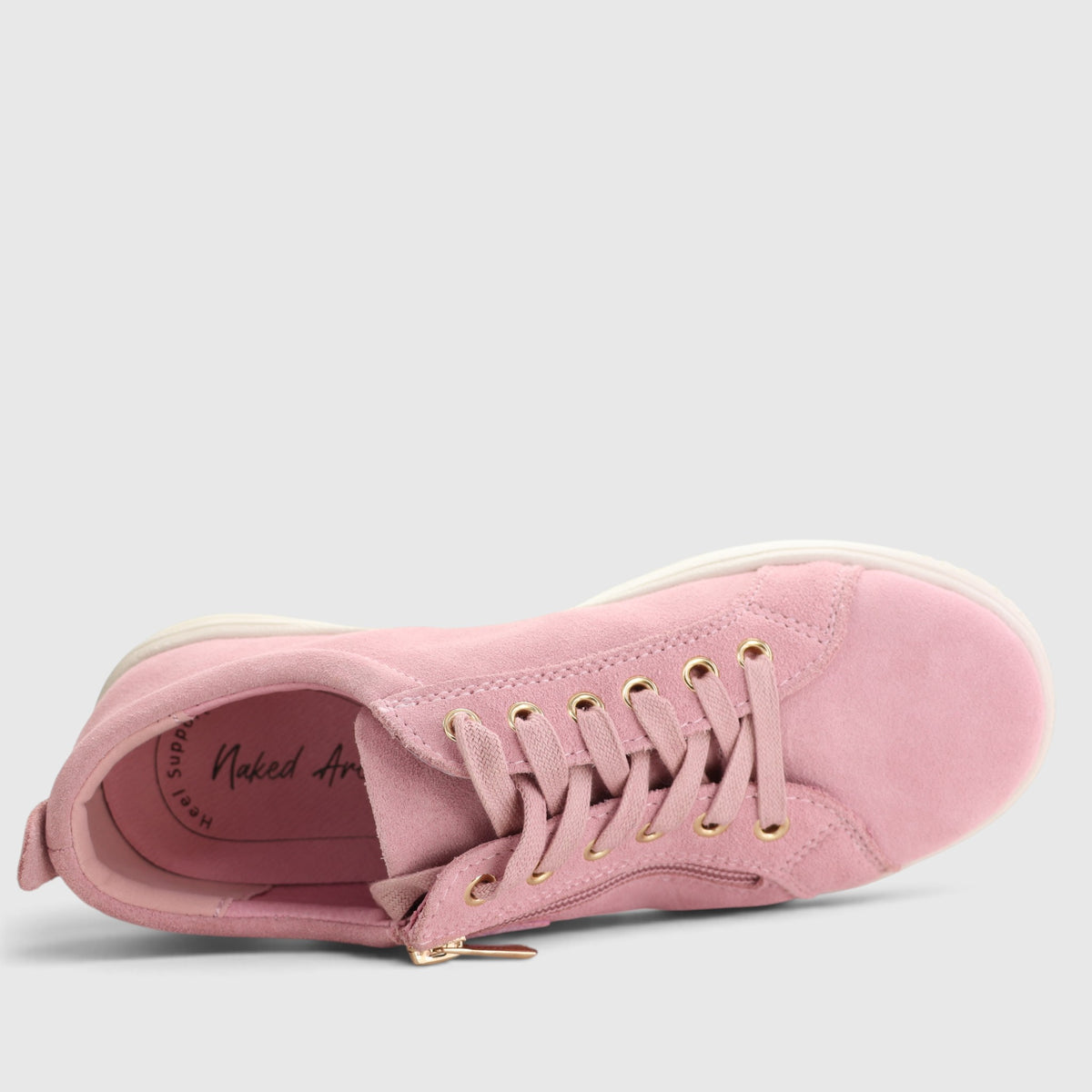 Pink Naked Arches Nelly baby sneakers with white laces and soft sole, designed for comfort and style for young children.