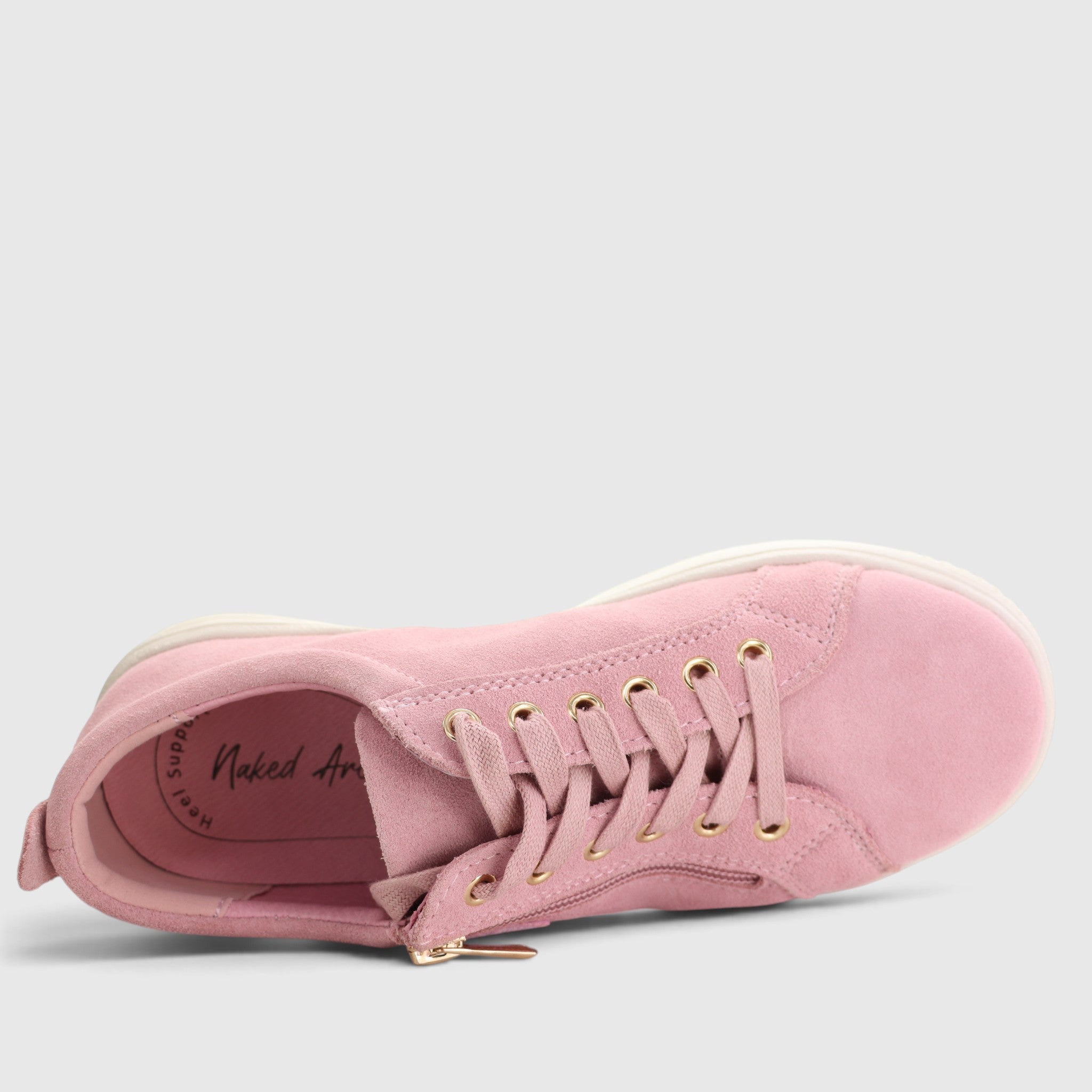 Naked Arches Nelly Baby Pink sneakers with soft pink fabric and white soles, featuring stylish design and comfortable fit.