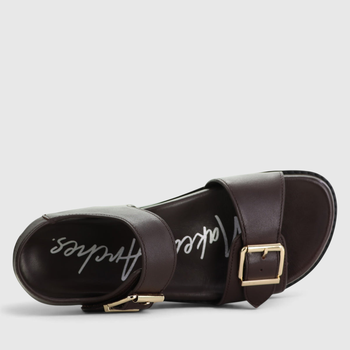 Naked Arches Ziggro Chocolate sandals with cushioned straps and textured soles, designed for comfort and casual wear.