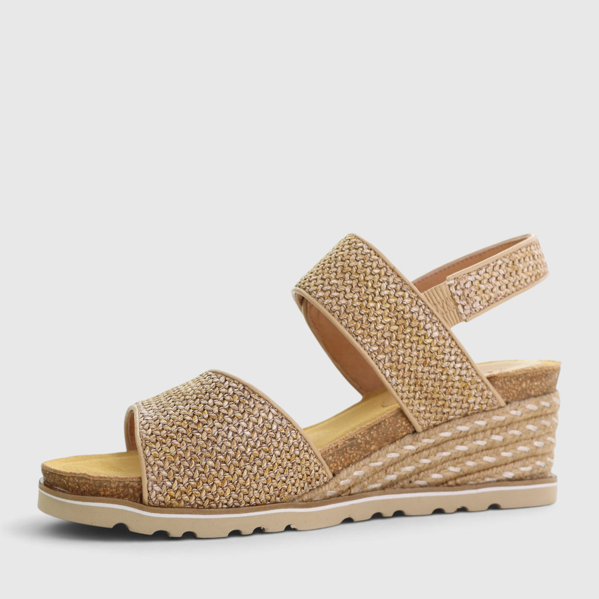 Le Sansa Evita beige raffia sandals with open toes and ankle straps, stylishly designed for casual and summer wear.