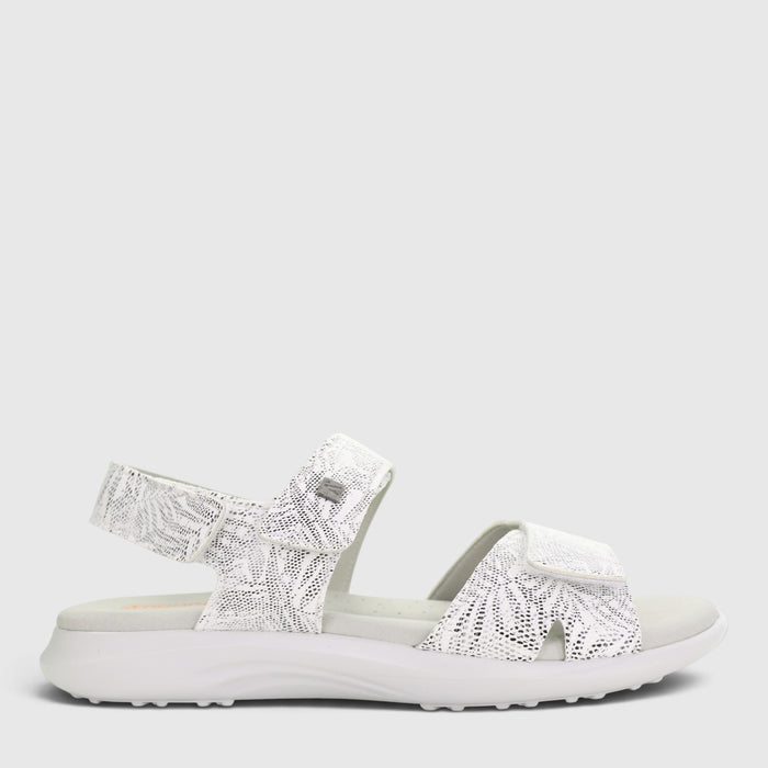 White Arcopedico Corbett sandals with adjustable straps and cushioned soles, designed for comfort and casual wear.