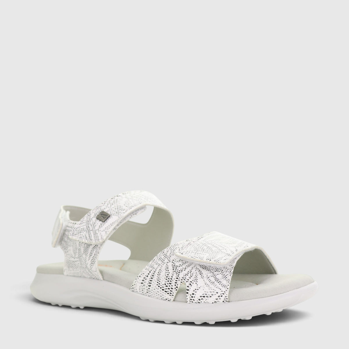 White Arcopedico Corbett sandals with adjustable straps and cushioned soles, designed for comfort and everyday wear.