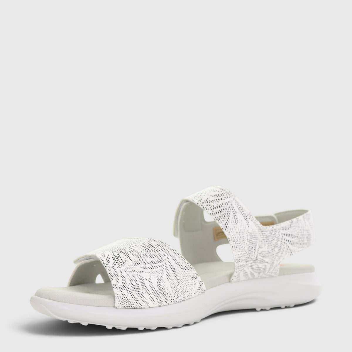 White Arcopedico Corbett sandals with comfortable straps and ergonomic design, perfect for casual wear.