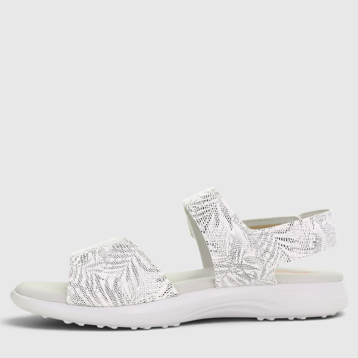 Arcopedico Corbett white sandals showing open-toe design, cushioned footbed, and adjustable straps on a neutral background.