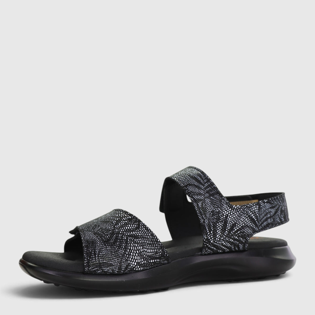 Black Arcopedico Corbett sandals with adjustable straps and cushioned footbed, designed for comfort and casual wear.
