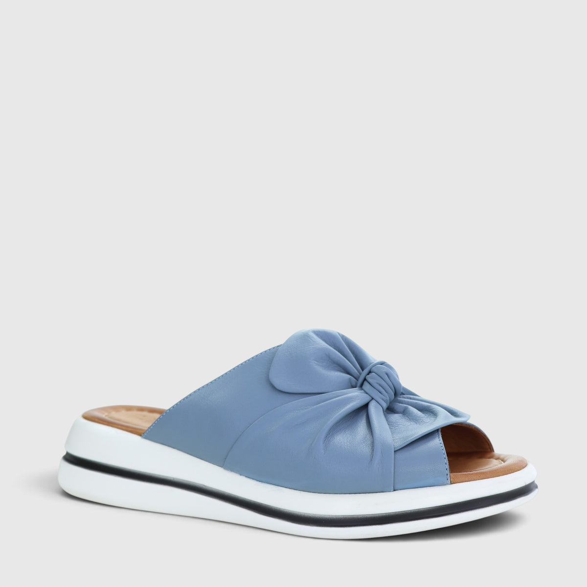 Le Sansa denim flats with a classic design, featuring denim fabric and comfortable slip-on style.