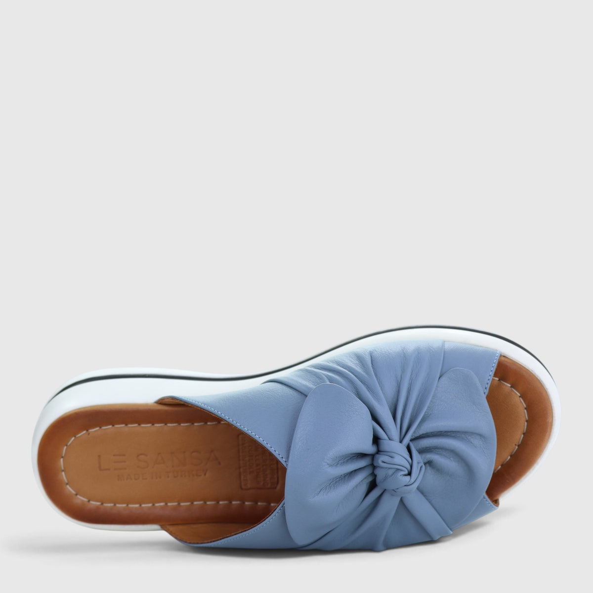 Le Sansa denim flats featuring a classic design with a comfortable slip-on style and clean denim fabric.