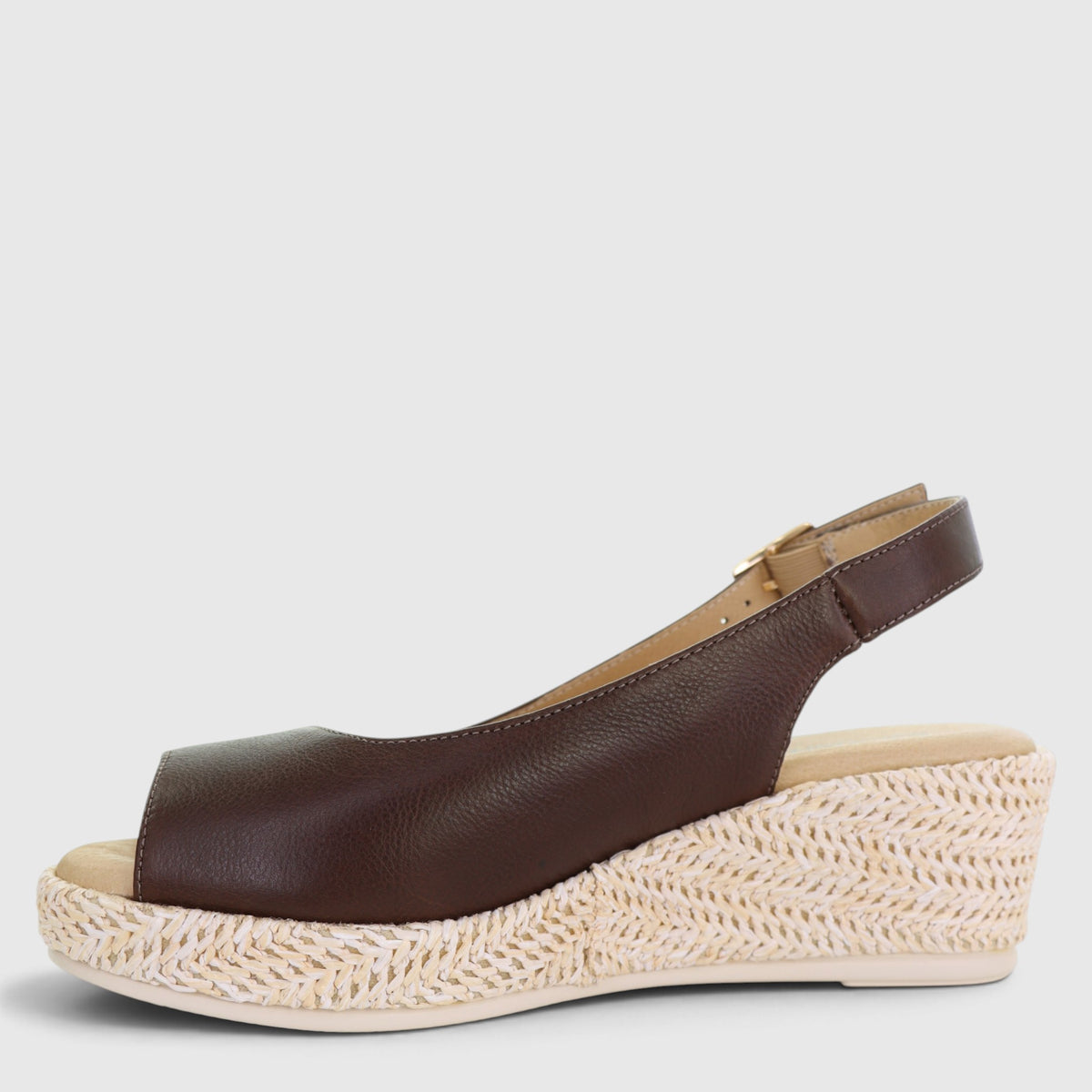 Le Sansa Petunia Chocolate sandals with open toes and ankle strap, featuring a stylish design and rich chocolate brown color.