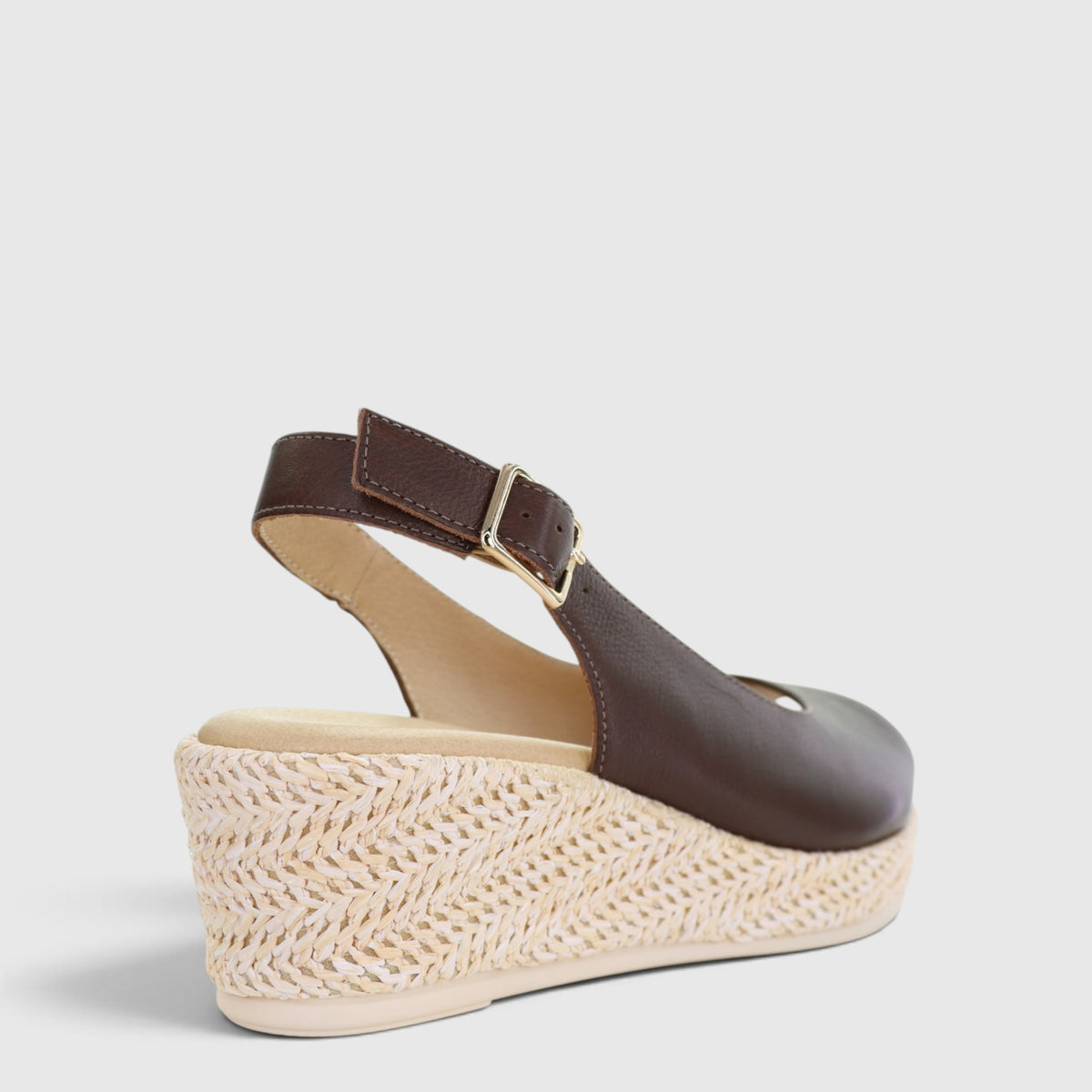 Le Sansa Petunia Chocolate sandals showing brown leather straps and comfortable flat sole.