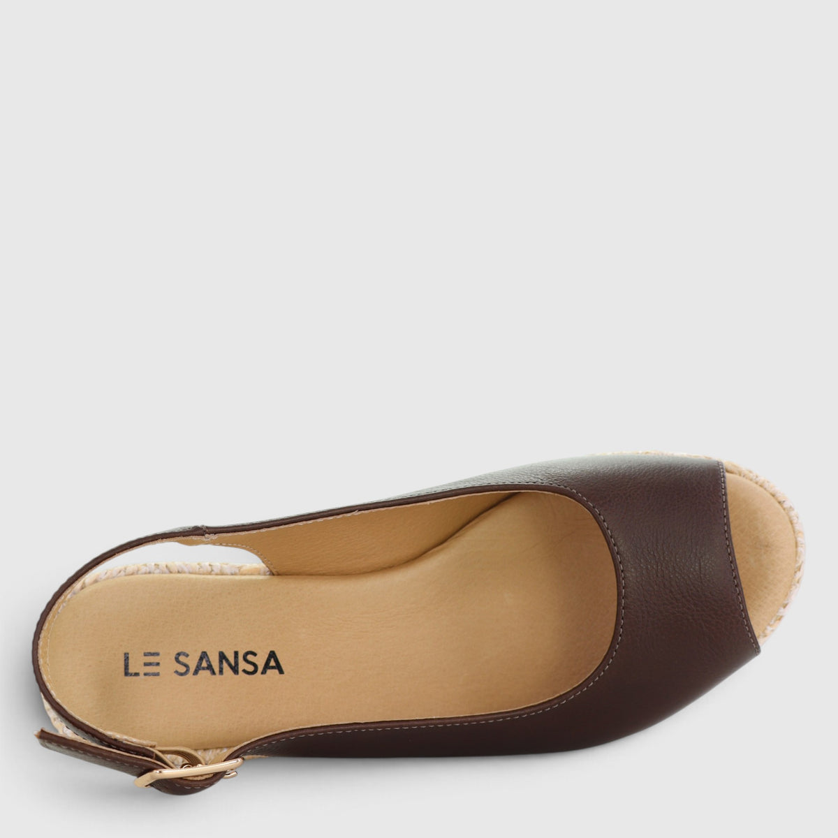 Le Sansa Petunia Chocolate sandals with ankle straps and open toe design, featuring a stylish and comfortable footwear style.