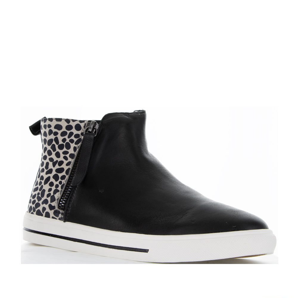 Le Sansa Indo Black Leopard boots featuring black and leopard print design with pointed toes and ankle height.