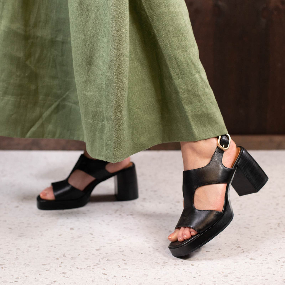 Eos Isora black sandals with adjustable straps and comfortable sole, stylish footwear for casual or summer wear.