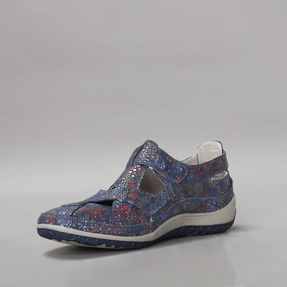 CC Resorts Jackie indigo floral flats with southwest-inspired design, featuring vibrant indigo and floral patterns.