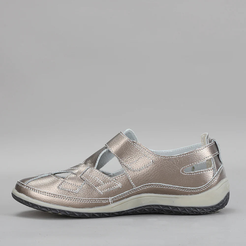 CC RESORTS Jackie pewter flats featuring a sleek, comfortable design perfect for casual wear.