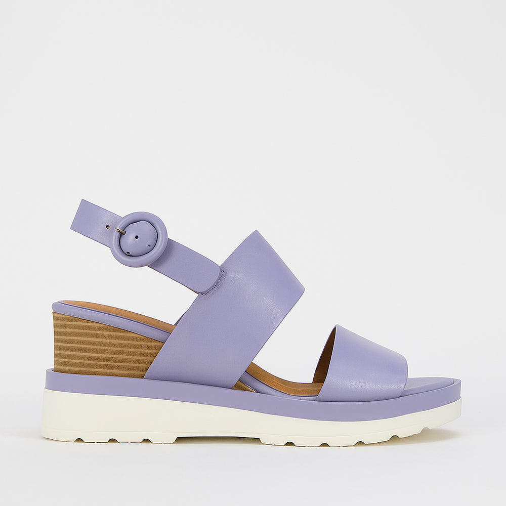 Eos Jades Lilac sandals with open toe design and ankle straps, showcasing a stylish and comfortable footwear option.
