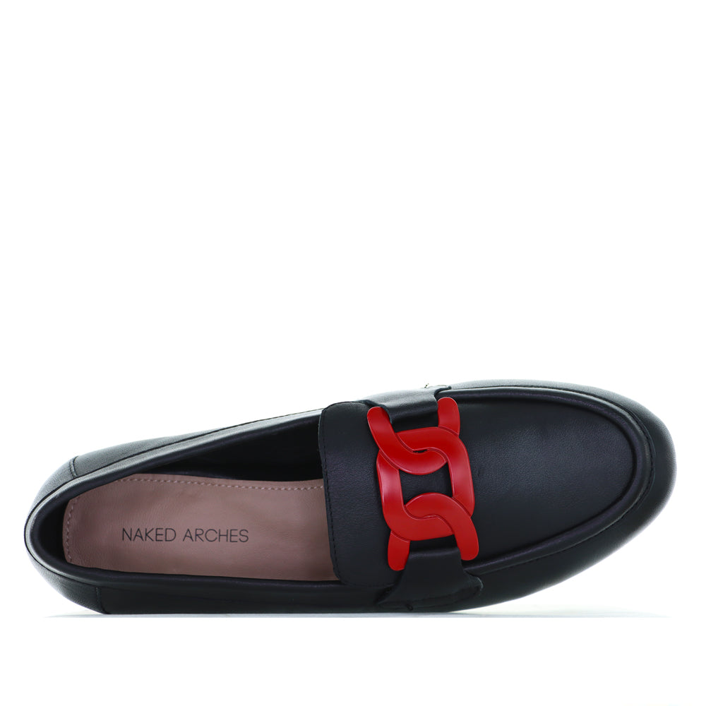 Naked Arches black and red loafers with sleek design and pointed toes, displayed on a neutral background.