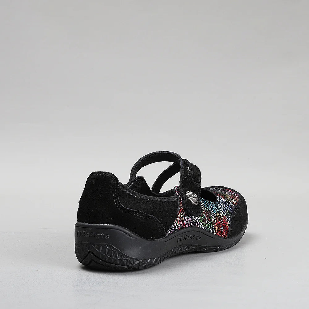 Black floral flats from CC Resorts JASMYN collection, featuring a comfortable slip-on design with a floral pattern.