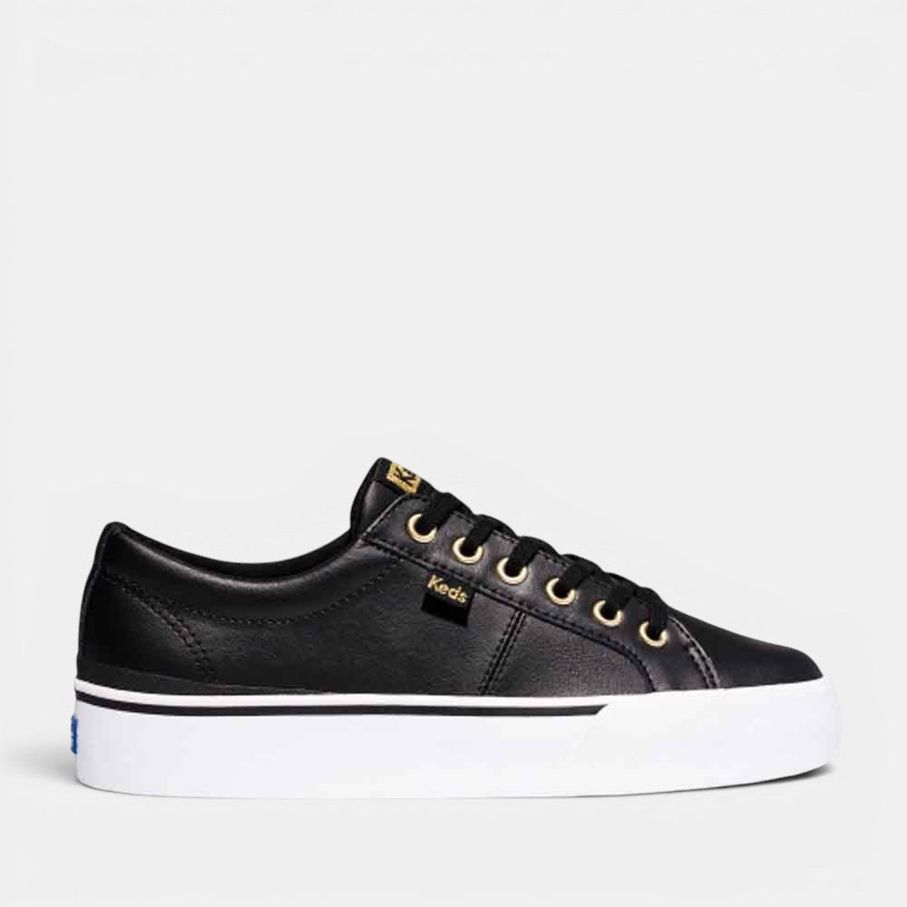 Black KEDS Jump Kick Duo sneakers with leather uppers and classic design, showcasing the stylish and comfortable footwear.