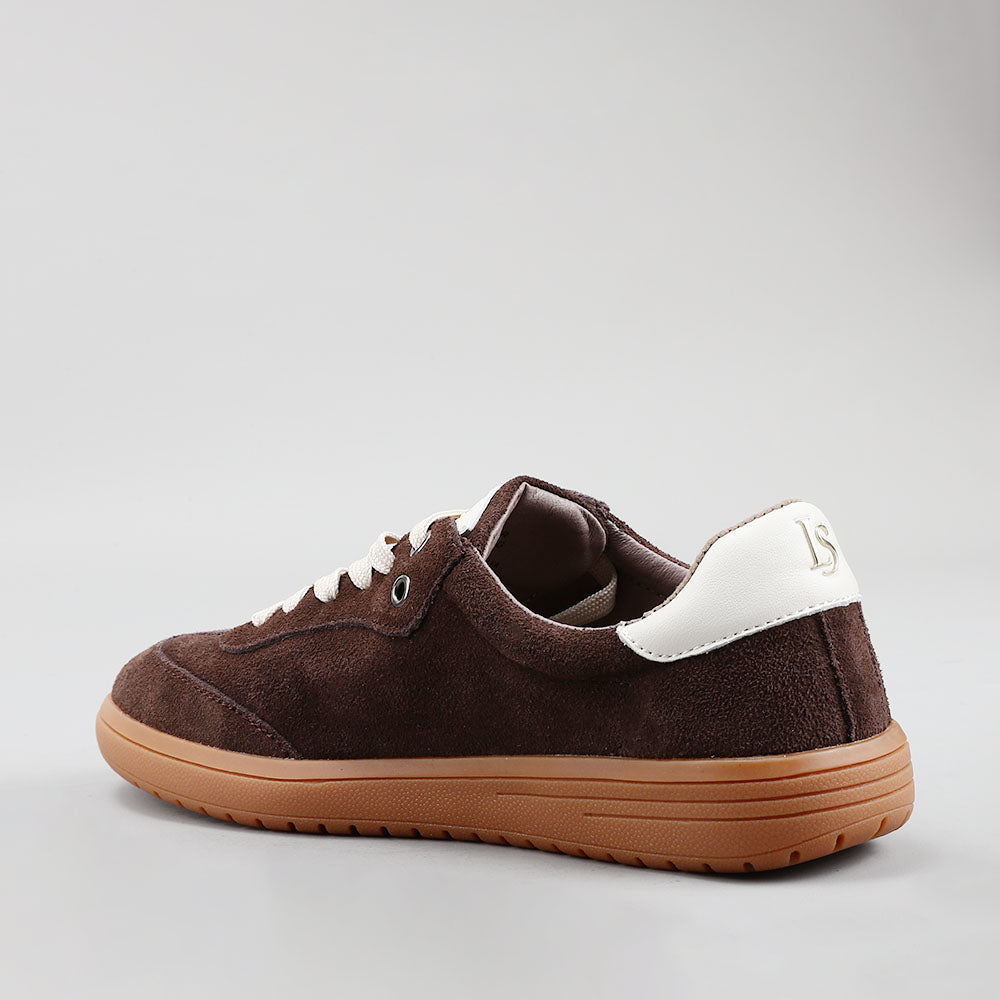 Le Sansa Juno sneakers in chocolate and ivory suede, featuring a stylish design and comfortable fit.