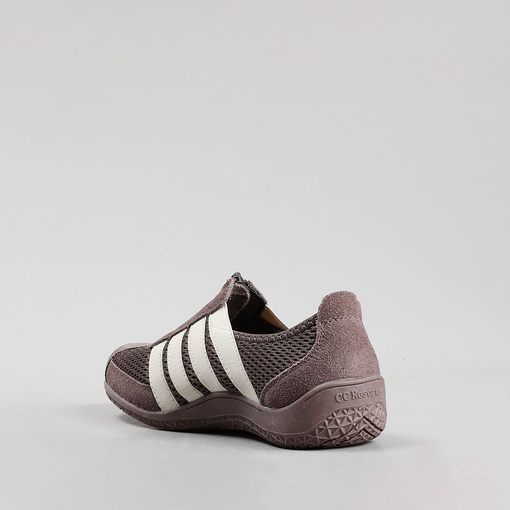 CC RESORTS JADA casuals in dark taupe and cream, shown on a model, featuring stylish and comfortable footwear.