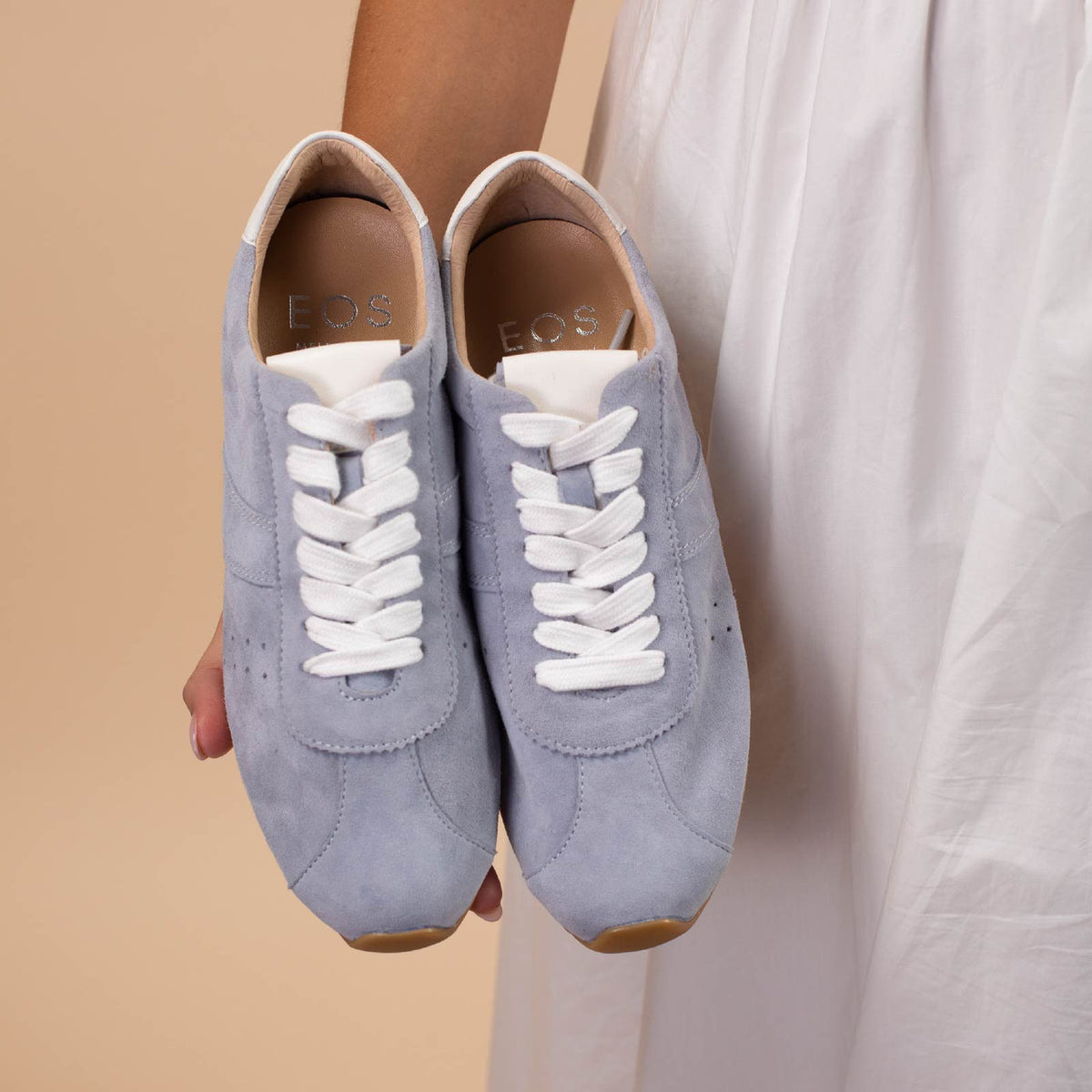 Eos Jazz light blue sneakers with white soles and laces, casual athletic shoes for comfortable everyday wear
