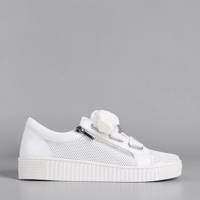 Eos Jovi white sneakers with sleek design, white laces, and minimal branding, showcasing stylish casual footwear.