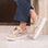 EOS Jovi Birch Perf sneakers, stylish white and beige athletic shoes with sleek design and comfortable fit.