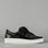 Black patent EOS Jovi sneakers with crinkle finish, showcasing sleek design and stylish comfort.