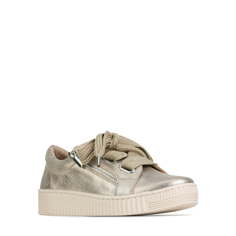 EOS Jovi Champagne sneakers featuring a sleek design with champagne-colored uppers and stylish laces.