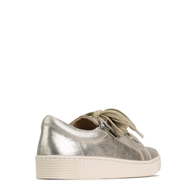 EOS JOVI champagne sneakers shown from the back angle, featuring a sleek design and light champagne color.