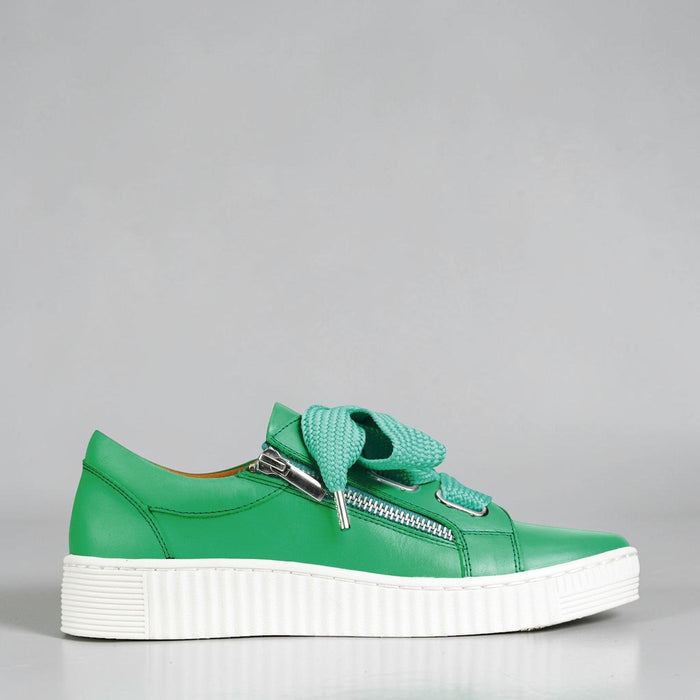 Eos Jovi Emerald sneakers outside view showing green and white athletic shoes with laces and stylish design.