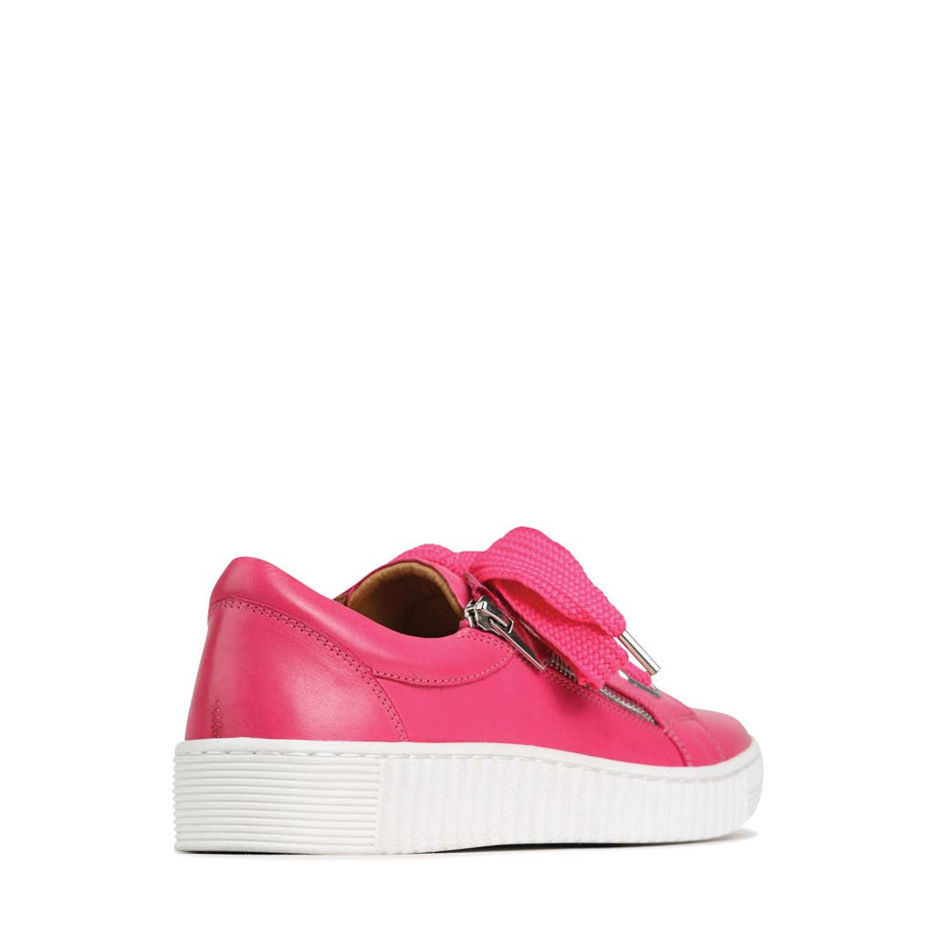 Eos Jovi Fuchsia sneakers shown from the back angle with vibrant pink color and sleek design.