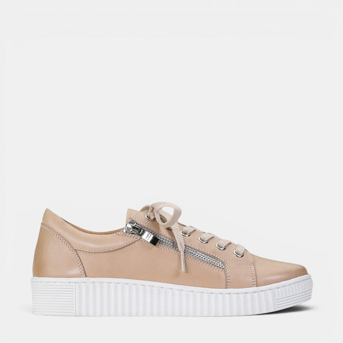 Eos Joyce Nude sneakers featuring a neutral-toned exterior and casual design, perfect for everyday wear.