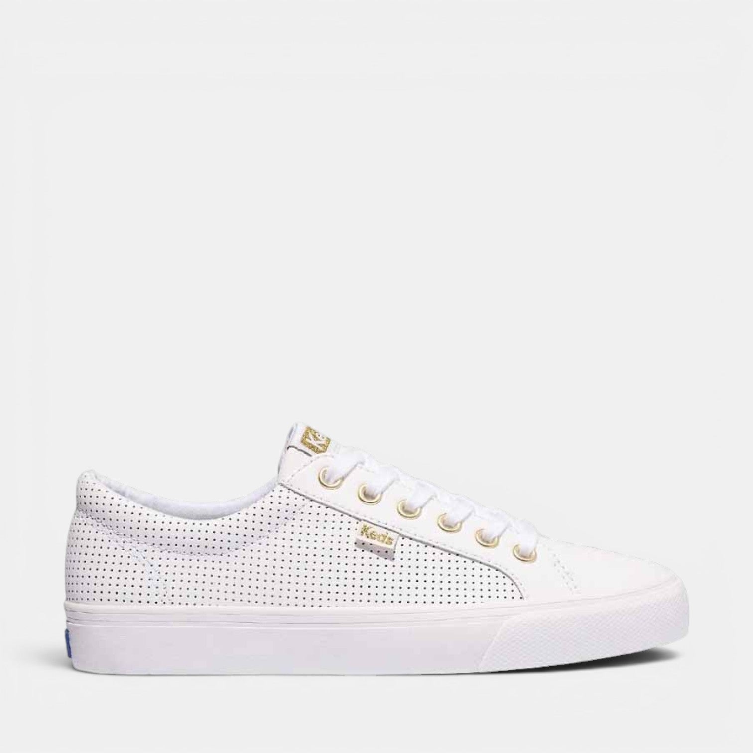 KEDS Jump Kick Perff white and gold sneakers with stylish design and white laces on clean white background.