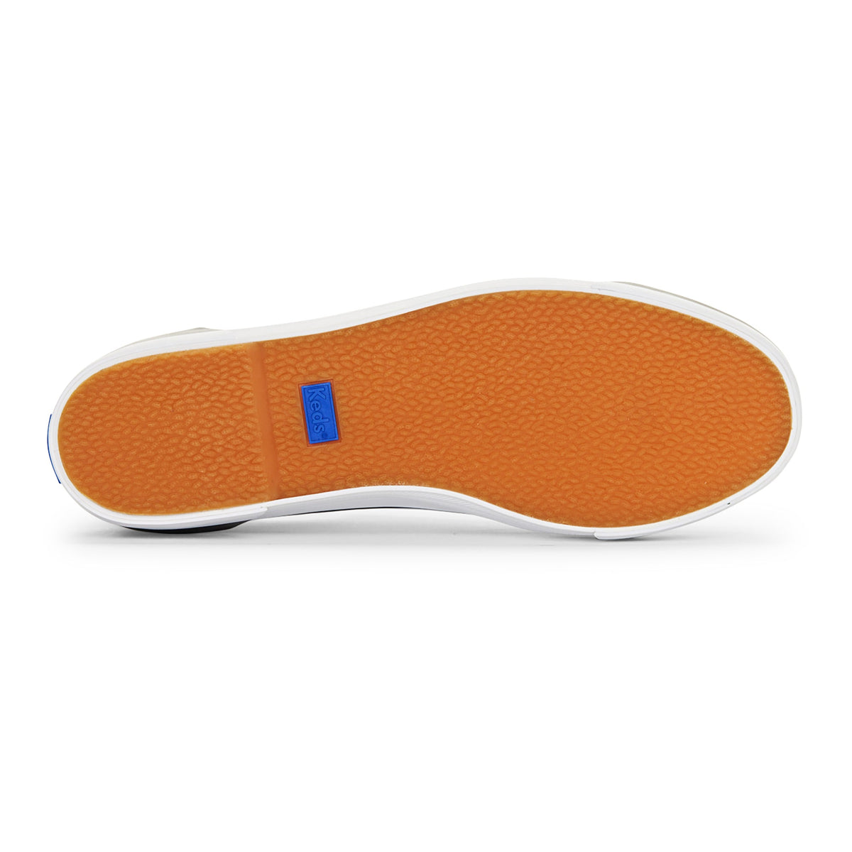 White KEDS Triple Up Bumper sneakers with cushioned soles, showcasing a clean design and lace-up style.