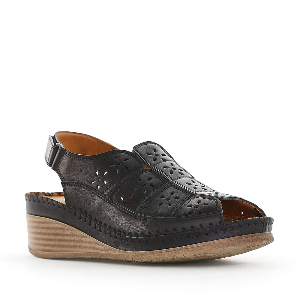 Black Le Sansa Kirra sandals with ankle straps and open toe design, showcasing stylish and comfortable footwear.
