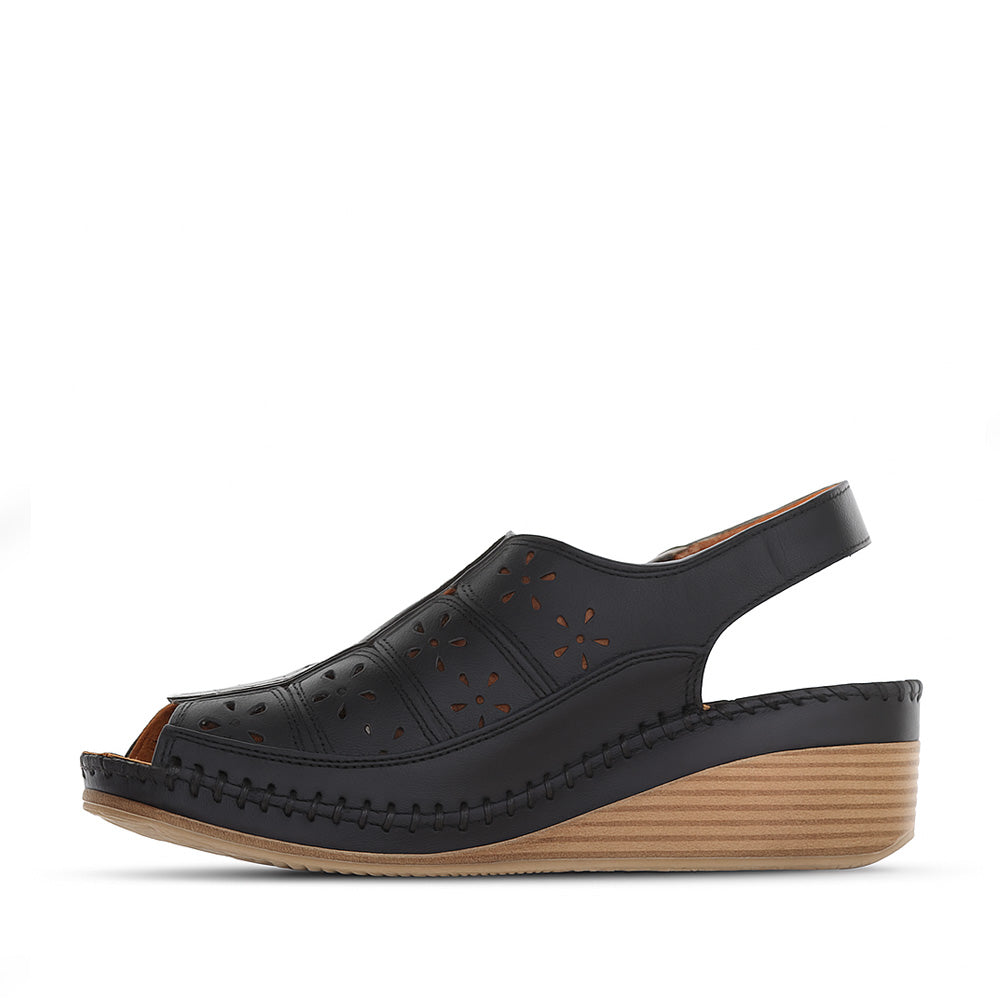 Le Sansa Kirra black sandals with open toe design and ankle straps, stylish footwear for casual or summer wear.