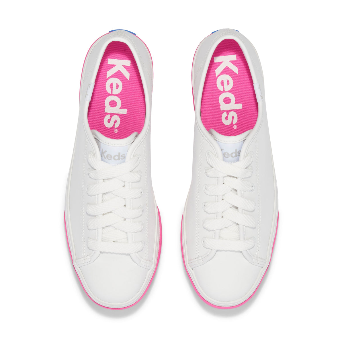 KEDS Triple Up white and pink sneakers with leather upper, stylish design, and comfortable fit, perfect for casual wear.
