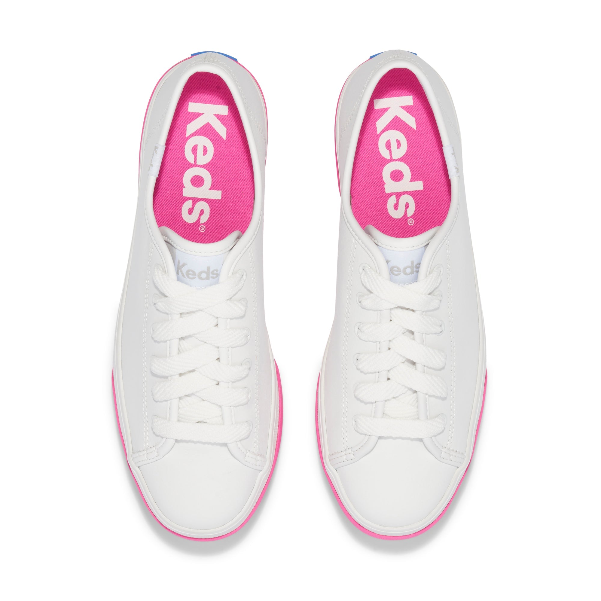 KEDS Triple Up white and pink sneakers with leather upper, stylish design, and comfortable fit, perfect for casual wear.
