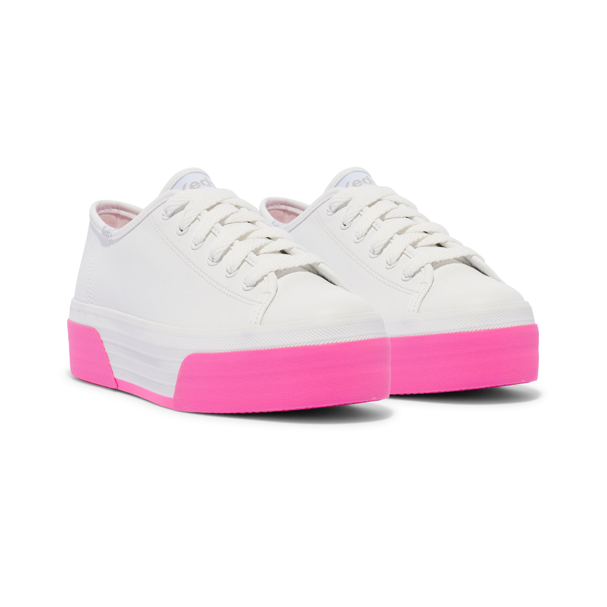 KEDS Triple Up white and pink sneakers with leather uppers, featuring a stylish design and comfortable fit.