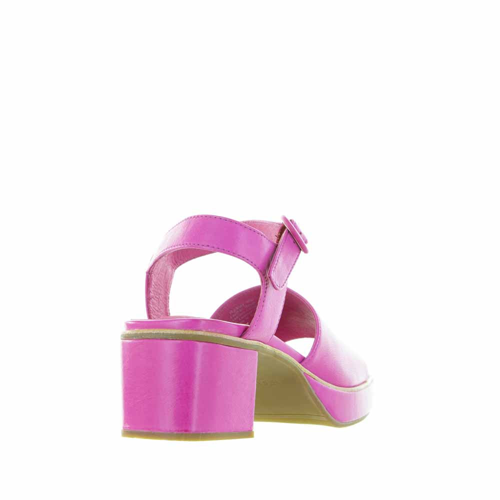 Le Sansa Ryalay hot pink sandals with open toe and ankle strap, stylish footwear for casual or summer wear.