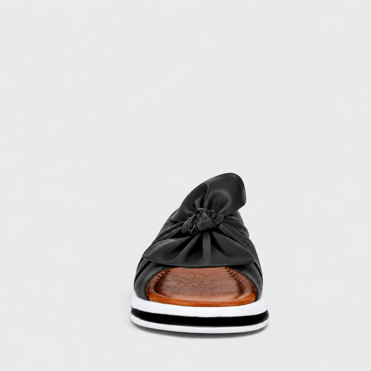 Black Le Sansa flats with sleek design, featuring a comfortable slip-on style and minimalist aesthetic.