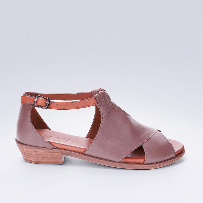 Le Sansa Digby Tan sandals featuring open-toe design and ankle straps, showcasing stylish and comfortable footwear.