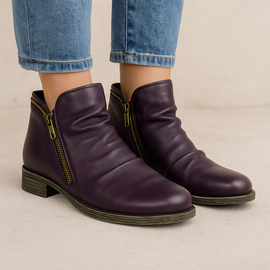 Le Sansa Lemon Purple boots featuring vibrant purple color and stylish design, perfect for casual or trendy outfits.