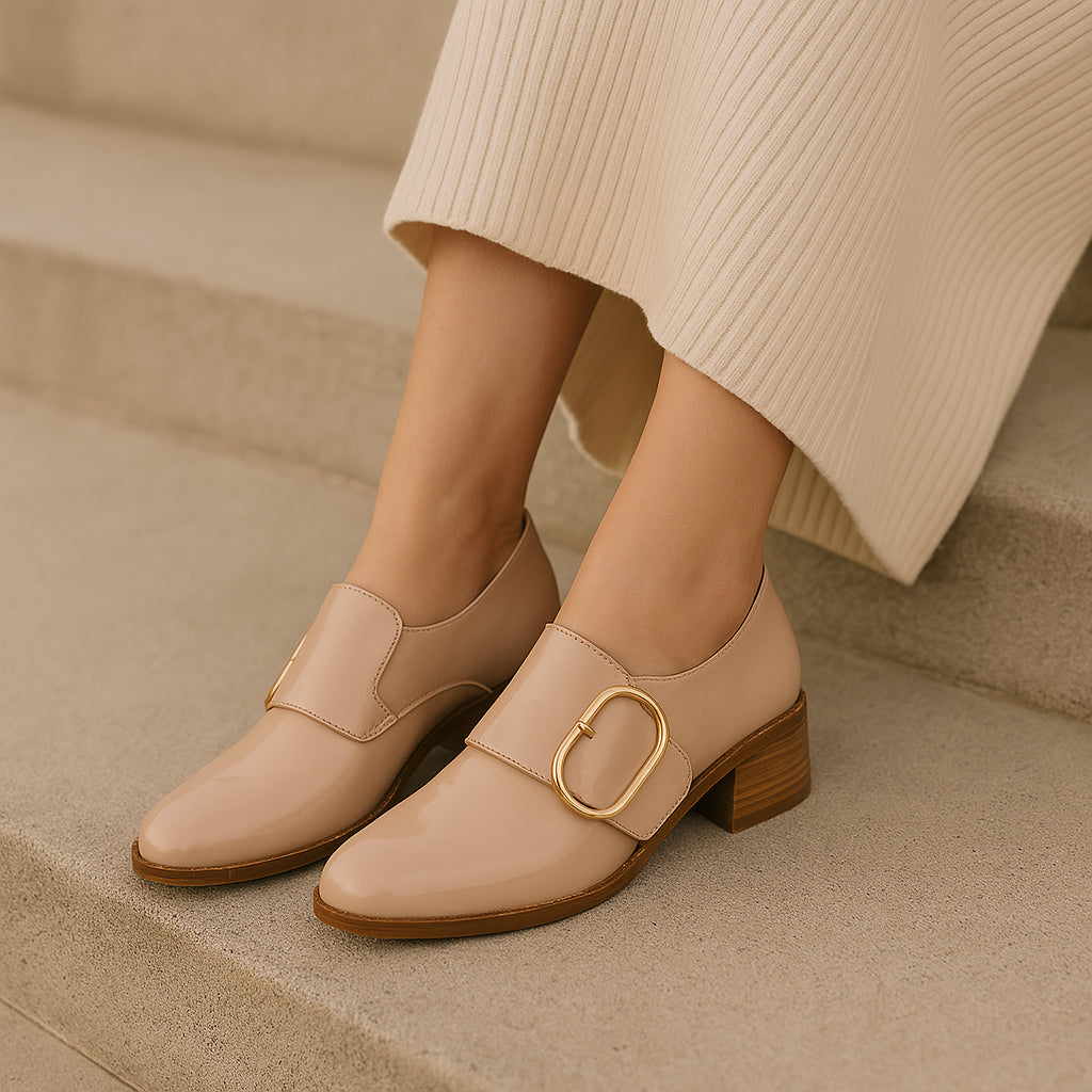 Le Sansa Rice Blush Patent loafers with sleek, shiny pink finish and classic slip-on design for stylish comfort.