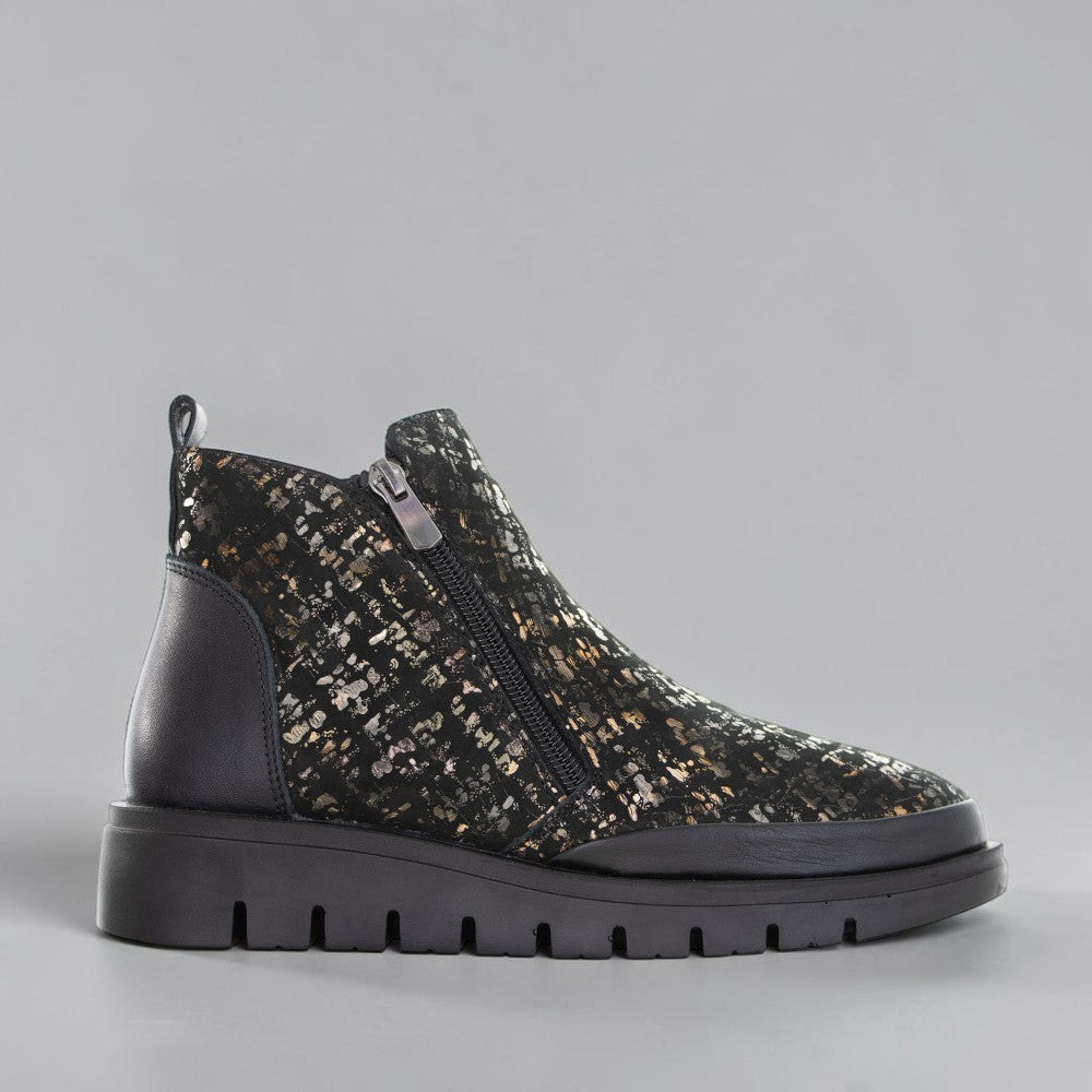 LE SANSA Rollie black printed boots with stylish design, showcasing their sleek silhouette and intricate print details.