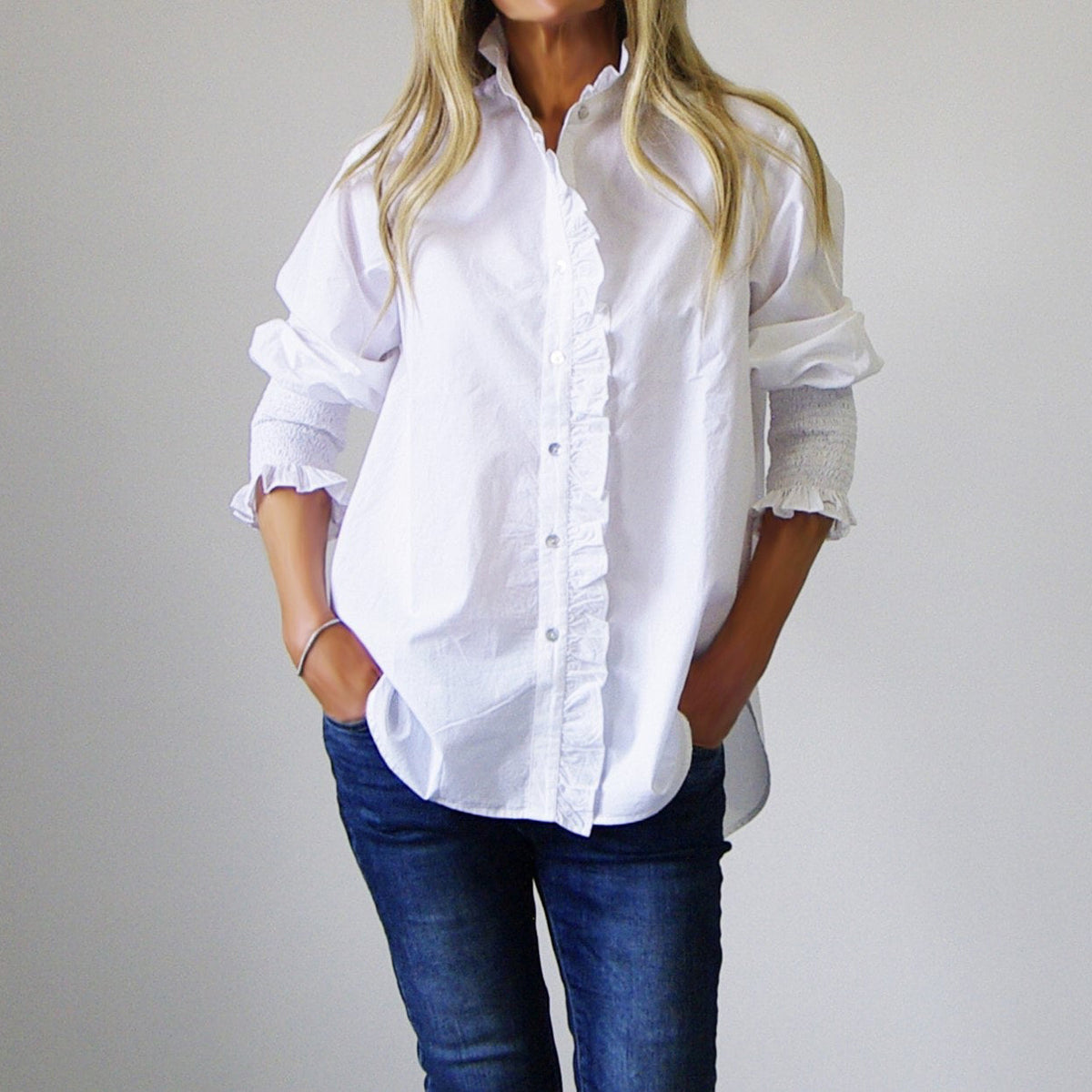 White blouse from Who's Charlie, long-sleeve top with a relaxed fit, perfect for casual or office wear.