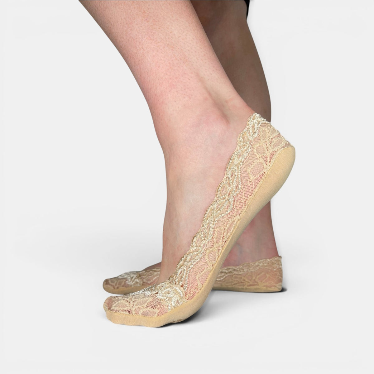 Minx lace sockette in nude color, featuring delicate lace design and snug fit, perfect for stylish, lightweight sock coverage.
