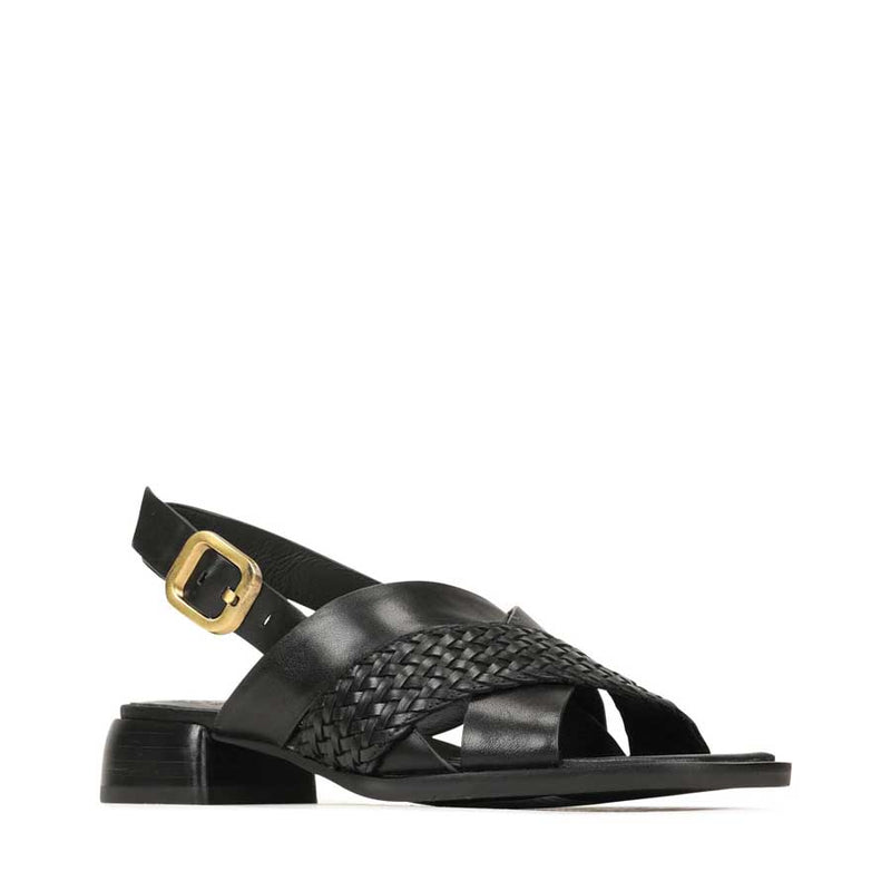 EOS Laticia Onyx sandals with black straps and chunky heel, displayed on a neutral background.